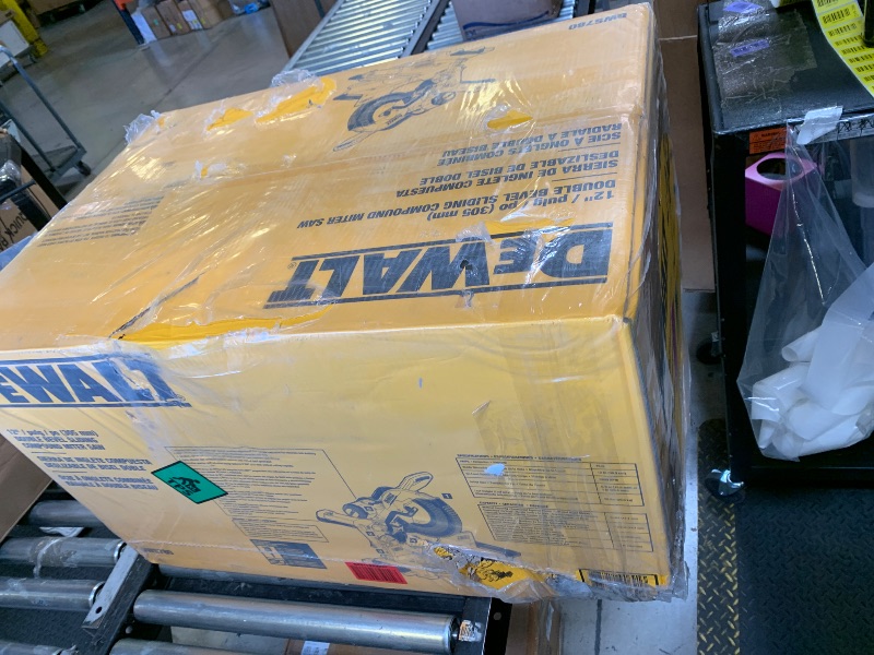 Photo 1 of DEWALT Miter Saw, 12-inch Double Bevel Sliding Compound Miter Saw with XPS LED Shadow Light System, Includes Blade Wrench, Material Clamp and Dust Bag (DWS780) (factory sealed)