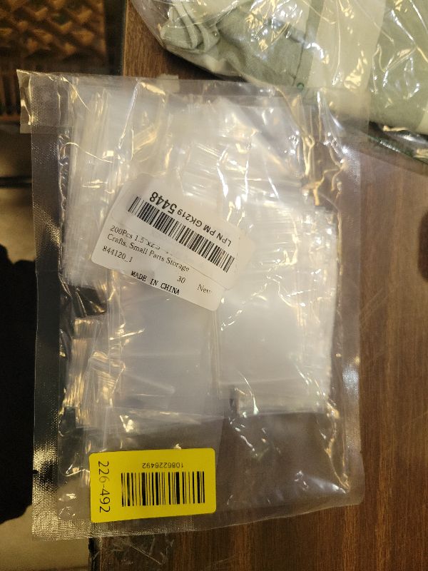 Photo 1 of 200Pcs 1.5"x2.5" 2 Mil Small Clear Plastic Bags, Plastic Reclosable Zip Seal Lock Bags Heavy Duty Mini Zip Bag Resealable Multipurpose Storage Bag for Jewelry, Bead, Crafts, Small Parts Storage