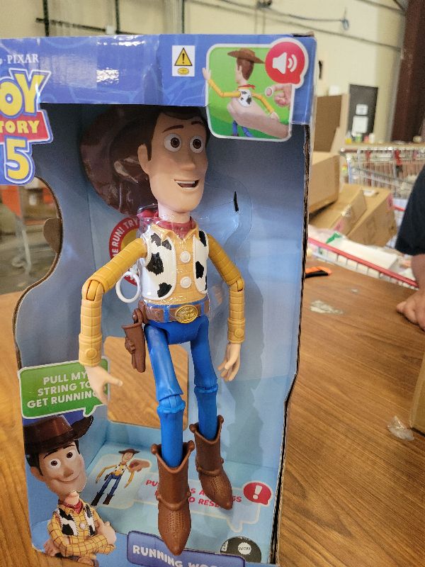 Photo 1 of ?Mattel Disney and Pixar Toy Story 5 Running Woody