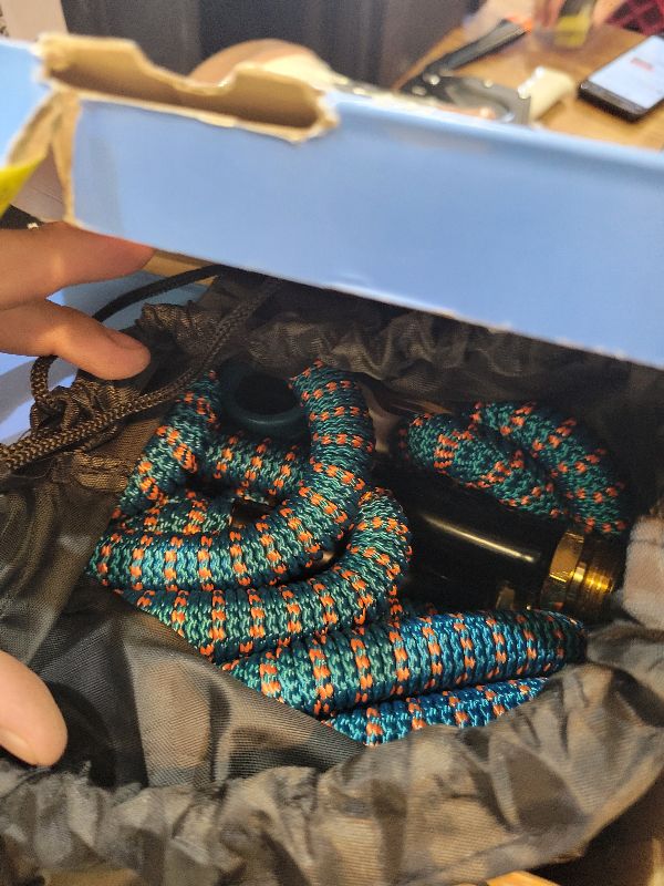 Photo 1 of 100 ft Expandable Garden Hose, 2026 New Retractable Water Hoses 100ft with 10 Function Spray Nozzle, Solid Brass Fittings, Extra Strength Fabric, Flexible Expanding Latex Core, Lightweight & No Kink