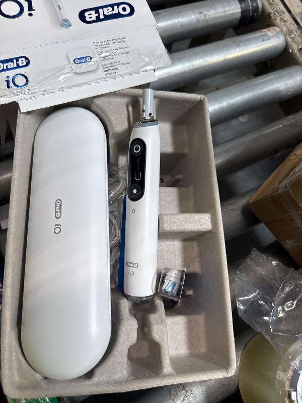 Photo 1 of [HEAVILY USED] Oral-B Rechargeable Electric Toothbrush, iO7 Limited Deep Clean + Protect, 5 Cleaning Modes, Interactive Display, Visible Pressure Sensor, 2 Brush Heads, Charging Travel Case, White