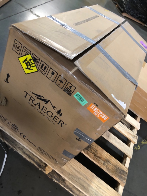 View 4 of **Has dent near power box. Power box is slightly popping out of place.** Traeger Grills Pro 22 Wood Pellet Grill & Smoker, Electric Pellet Smoker Grill Combo, 6-in-1 BBQ Versatility, 572 sq. in. Grilling Capacity, Meat Probe, 450 Degree Max Temperature, 1
