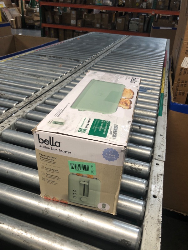Photo 1 of ***NONFUNCTIONAL FOR PARTS ONLY***
bella 4 Slice Slim Toaster, Fits-anywhere™ Kitchenware, 6 Setting Shade Control with Reheat & Cancel Buttons, Fits Sourdough, 10” Long Slot, Anti Jam & Auto Shutoff, 900 Watt, Seaglass