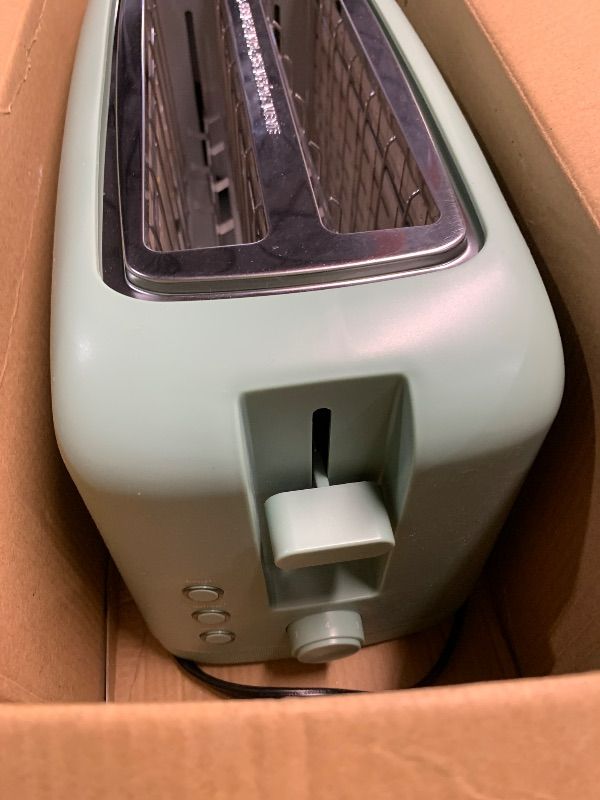 Photo 1 of ***NONFUNCTIONAL FOR PARTS ONLY***
bella 4 Slice Slim Toaster, Fits-anywhere™ Kitchenware, 6 Setting Shade Control with Reheat & Cancel Buttons, Fits Sourdough, 10” Long Slot, Anti Jam & Auto Shutoff, 900 Watt, Seaglass