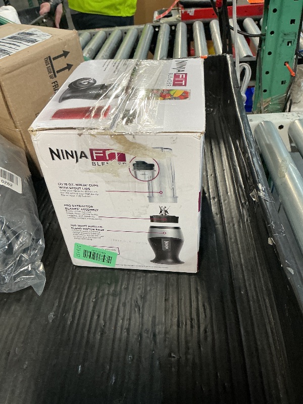 Photo 1 of *Missing blade*Ninja Fit Compact Personal Blender | For Smoothies, Shakes & Frozen Drinks | (2) 16-oz. To-Go Cups with Spout Lids | 700-Watt Countertop | Black | QB3001SS