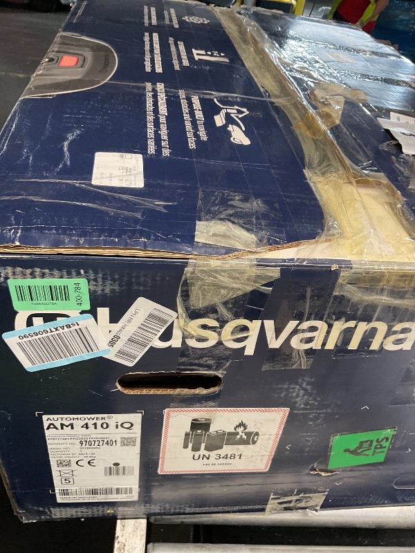 Photo 1 of ***EXTREMELY FIRTY AND USED***Husqvarna Automower 410iQ Robotic Mower, 0.5 Acre Mowing Capacity, Wire Free Robot Lawn Mower with Charging Station, RS1 EPOS Reference Station and Replacement Blades