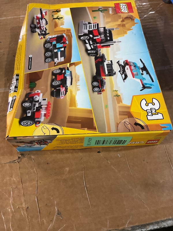 View 4 of ** factory sealed **
LEGO Creator 3 in 1 Flatbed Truck with Helicopter Toy, Transforms from Flatbed Truck Toy to Propeller Plane to Hot Rod and SUV Cars, Gift Idea for Boys and Girls Ages 7 Years Old and Up, 31146