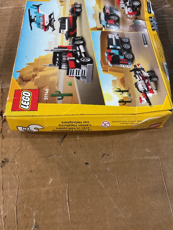 View 3 of ** factory sealed **
LEGO Creator 3 in 1 Flatbed Truck with Helicopter Toy, Transforms from Flatbed Truck Toy to Propeller Plane to Hot Rod and SUV Cars, Gift Idea for Boys and Girls Ages 7 Years Old and Up, 31146