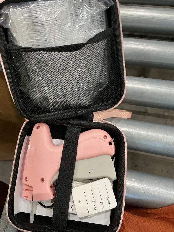 Photo 1 of **See Clerk Notes**BEVTEE Clothes Tagging Gun with Accessories, Pink White