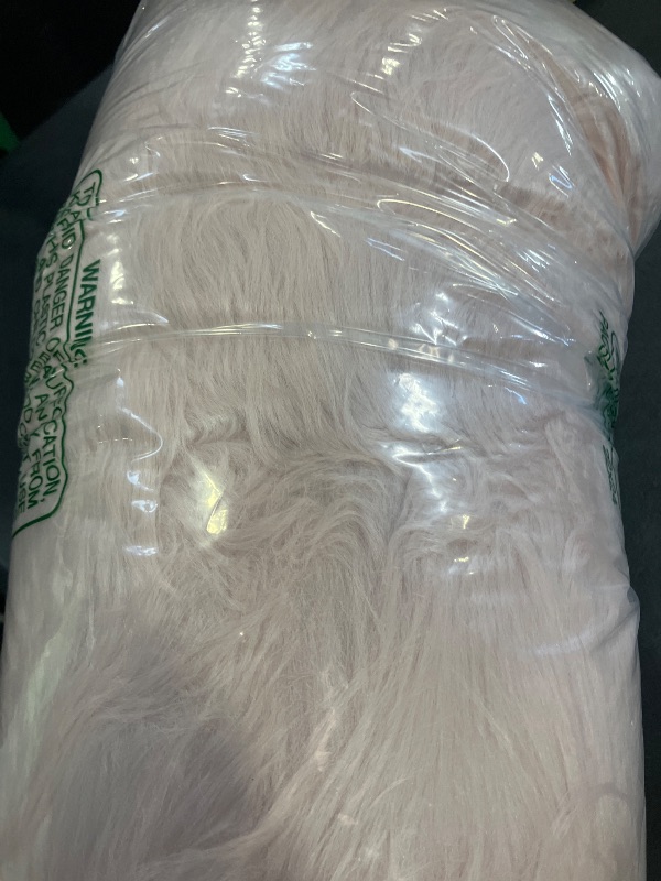 Photo 1 of Tangsoo Faux Fur Sheepskin Rug - Pink, 2x4 ft