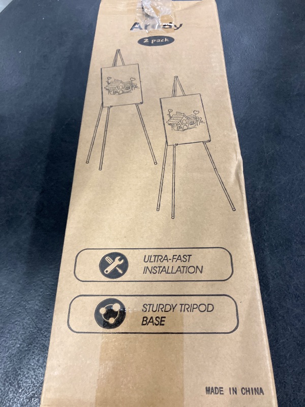 Photo 1 of Easel Stand for Sign, Aredy 63" Portable Painting Easel, Lightweight Metal Easels for Painting Canvas, Wedding Sign (2 Pack)