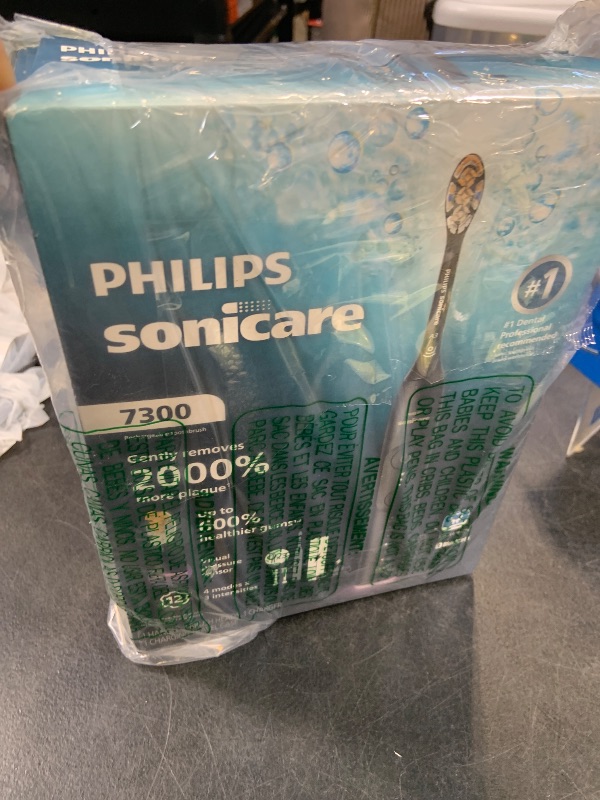 Photo 1 of Philips Sonicare 7300 Rechargeable Electric Toothbrush, 3 Brush Head, Black