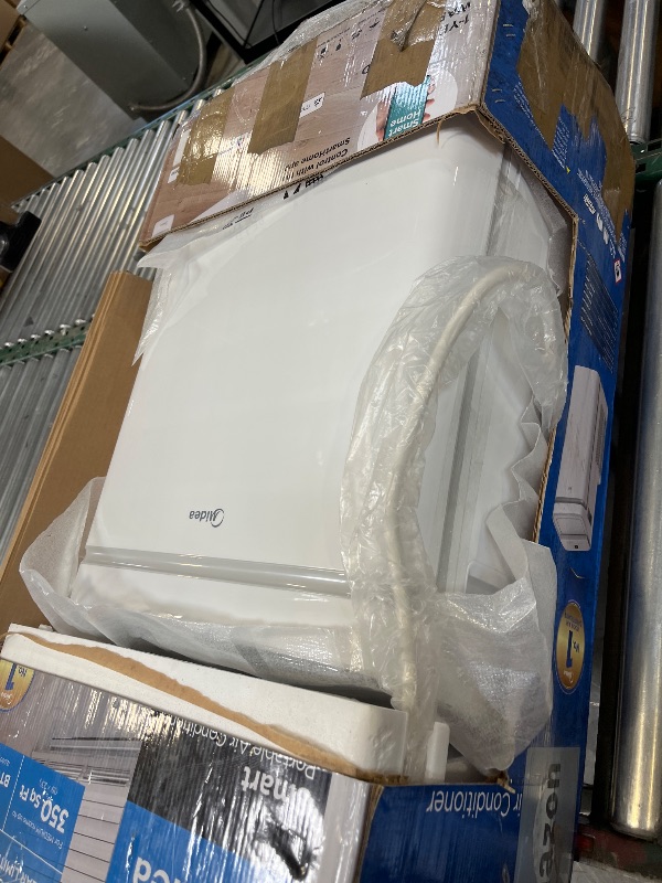 Photo 1 of Midea 12,000 BTU Portable Air Conditioner