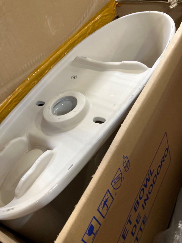 Photo 1 of TOTO Drake Two-Piece Elongated Toilet - 1.28 GPF, Universal Height, Cotton White