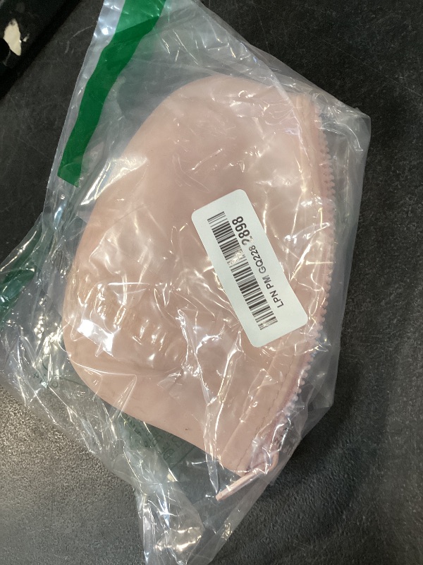 Photo 1 of WHHJM Small Makeup Bag Premium Silicone Purse Bag Multifunctional Essential Bag Zipper Pouch Water and Heat Resistant (Pink)