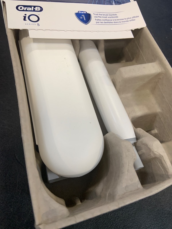 Photo 1 of Oral-B Rechargeable Electric Toothbrush, iO5 Customizable Clean, 5 Cleaning Modes, Visual Pressure Sensor to Protect Gums, Travel Case, White