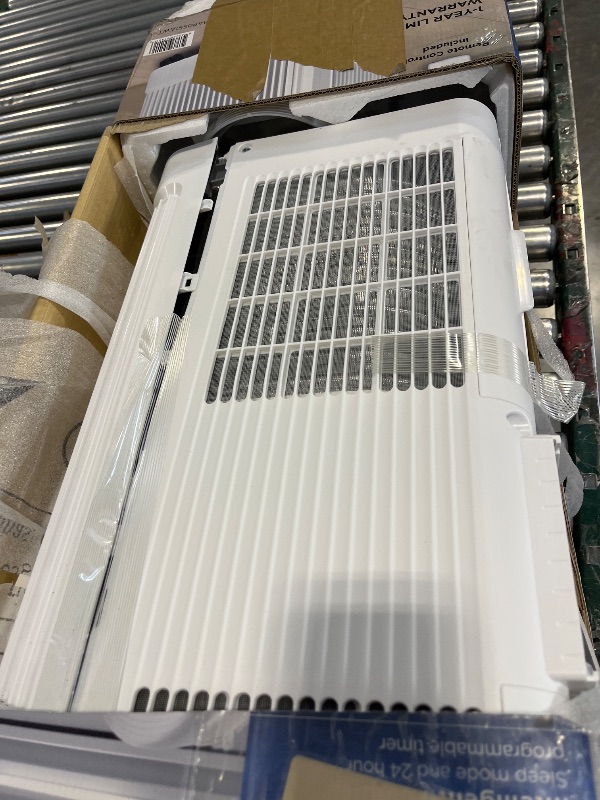 Photo 1 of Midea 8,500 BTU Smart Portable Air Conditioner---damaged ------sell for parts 