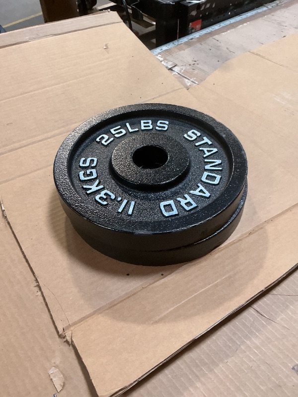 Photo 1 of **SET OF 2 25 lb PLATES** paint chipping