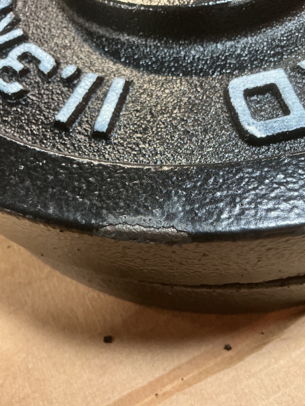 Photo 1 of **SET OF 2 25 lb PLATES** paint chipping