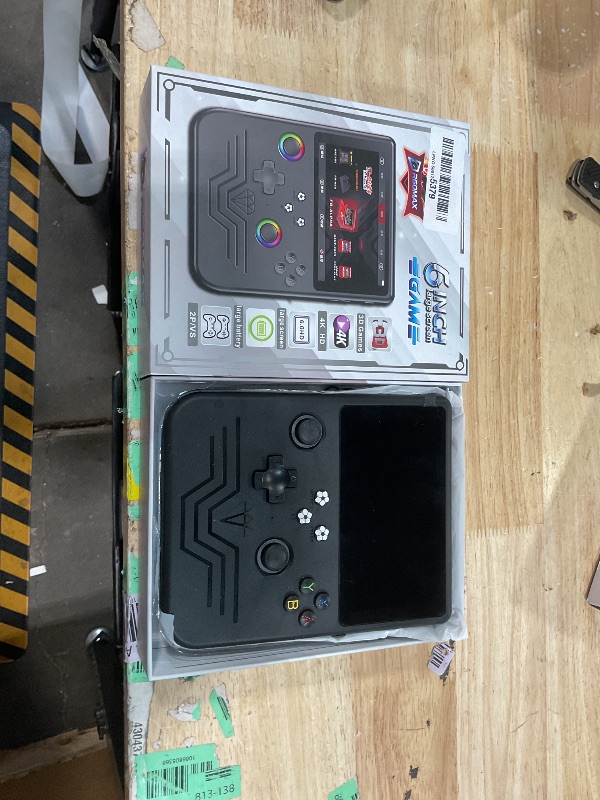 Photo 1 of ***PARTS ONLY**NON FUNCTIONAL (SELECT & START BUTTONS DON'T WORK)***PandoraGame R60MAX Retro Handheld Gaming Console, 6.0-Inch HD IPS Screen, 6000mAh Battery, 40000+ Classic Games Pre-Installed, Save/Load State, Linux OS, Gift for Gamers (Black)