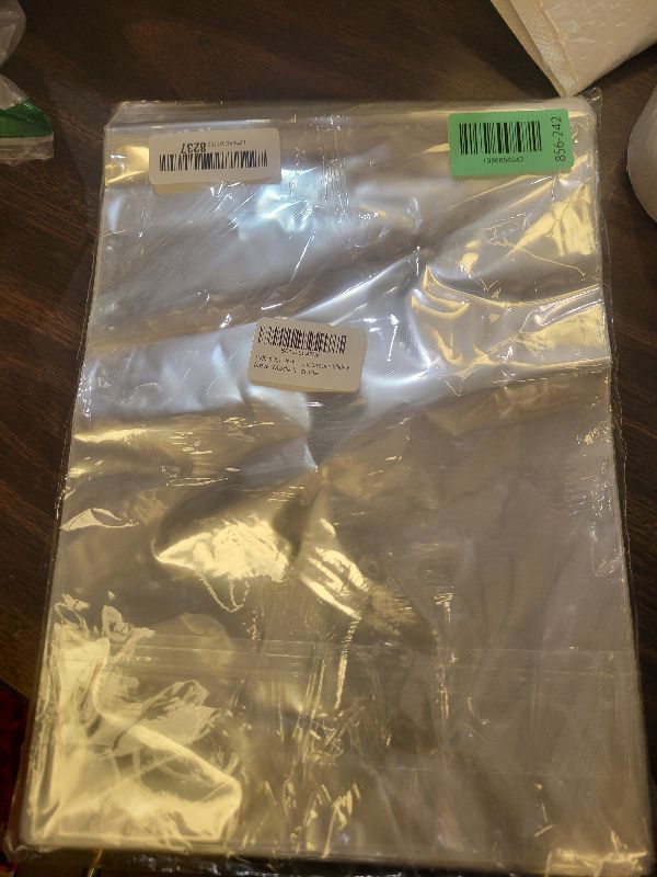 Photo 1 of 100pcs 9x12 Inch 2.8 mil Clear Resealable Adhesive Cello Treat Bags - Self Sealing OPP Plastic Bag Good for dust, Bugs, Moisture and Mildew.