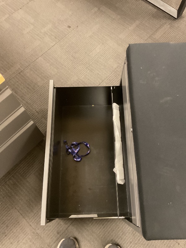 Photo 1 of 2 shelf large cabinet with cushioned top. Missing keys