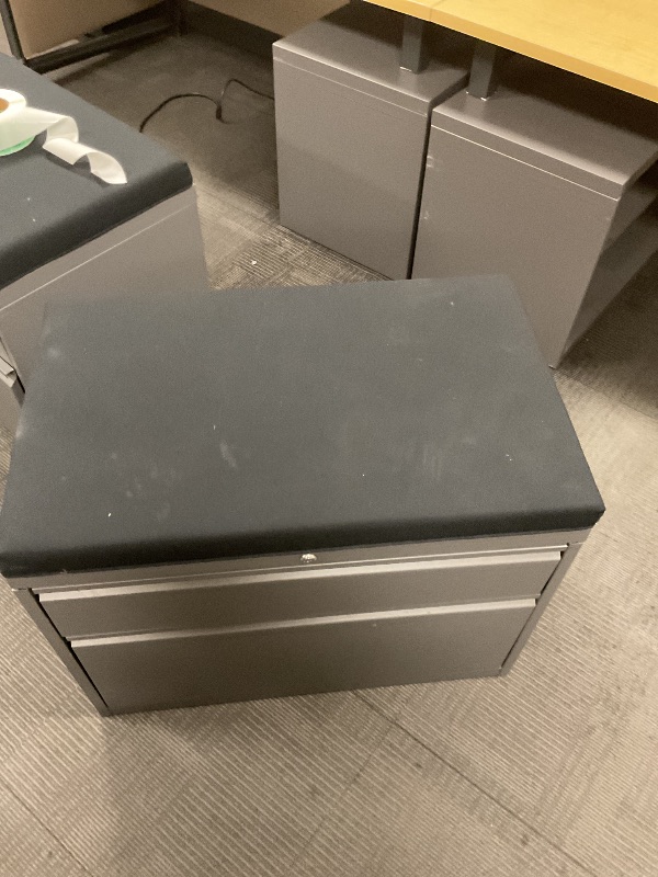 Photo 1 of 2 shelf large cabinet with cushioned top. Missing keys