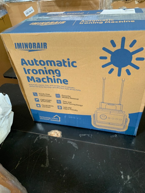 Photo 1 of Silver-Infused Automatic Ironing Machine with Remote Control