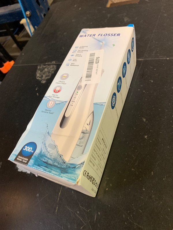 Photo 1 of Binzls Water Dental Flosser - 300ML Portable, 4 Modes, IPX7 Waterproof