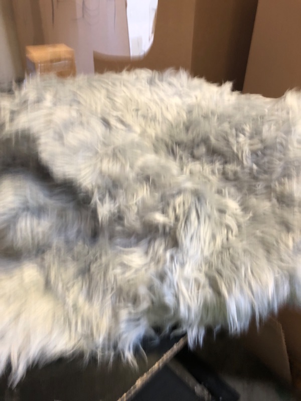 Photo 1 of Goolela Faux Sheepskin Fur Rug 4x6 Grey Fluffy Fuzzy Furry Area Rug for Bedroom Playroom Plush Shaggy Washable Irregular Sheepskin