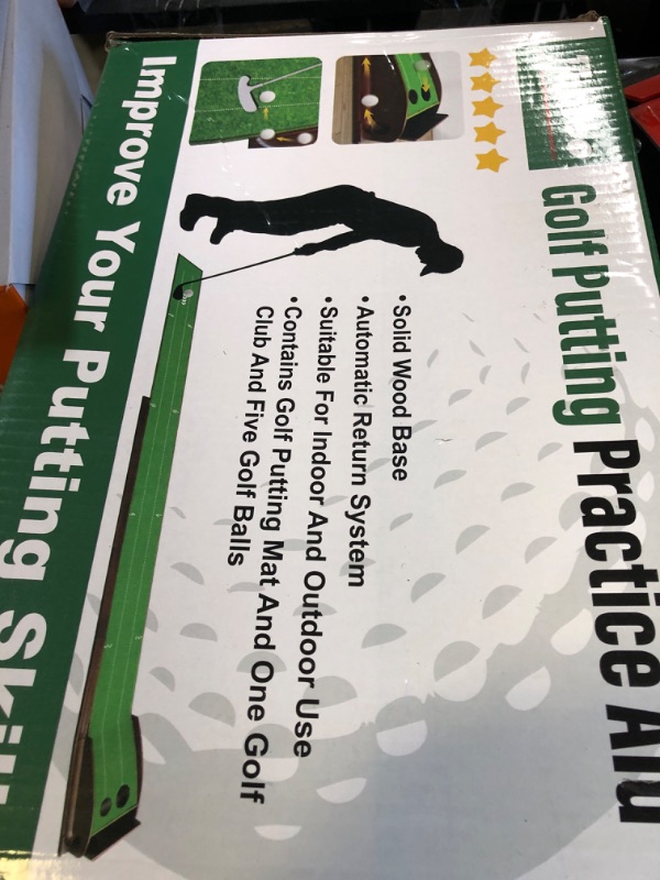 Photo 1 of Toptoo Golf Putting Mat with Ball Return