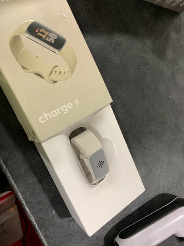 Photo 1 of Google Fitbit Charge 6 - Fitness Tracker - Porcelain/Silver