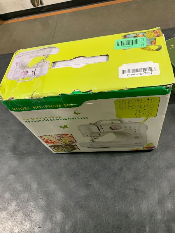 Photo 1 of QVNIE Compact Sewing Machine with 12 Stitches (Purple)
