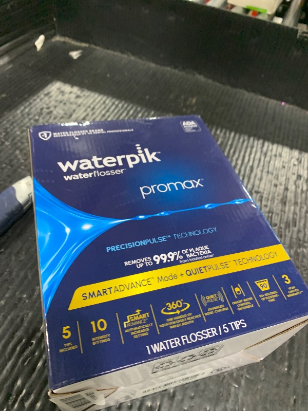 Photo 1 of Waterpik Promax Countertop Water Flosser, SmartAdvance, 10 Settings, 5 Tips