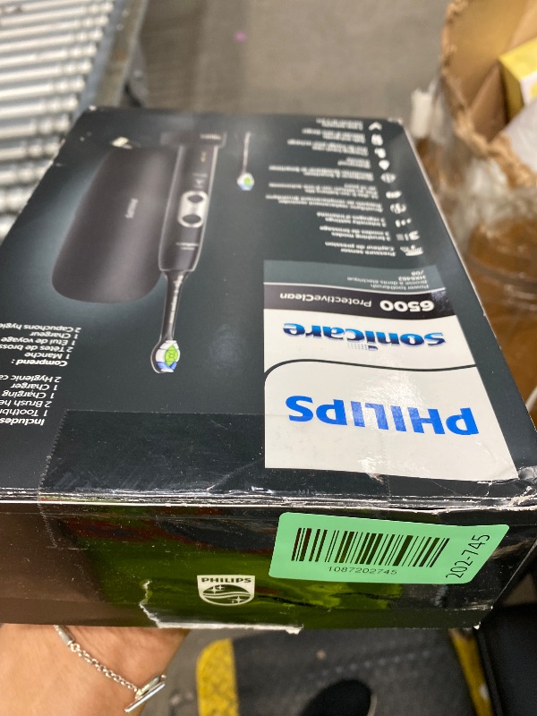 Photo 1 of *Extremely used doesn’t work.****Philips Sonicare ProtectiveClean 6500 Rechargeable Electric Toothbrush, with Pressure Sensor, 3 Cleaning Modes, SmarTimer and QuadPacer, 14-Day Battery Life, Charging Travel Case, Black, HX6462/08
