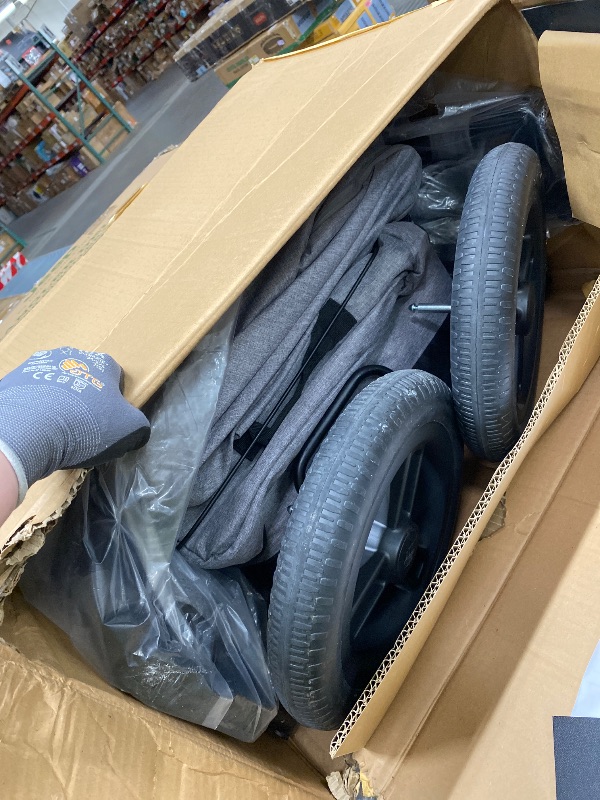 Photo 1 of *Used* Jeep Wrangler Deluxe 4 Seater Stroller Wagon by Delta Children - Premium Quad Stroller Wagon for 4 Kids with Convertible Seats, Adjustable Push/Pull Handles, Removable Canopy & Flat Fold, Grey