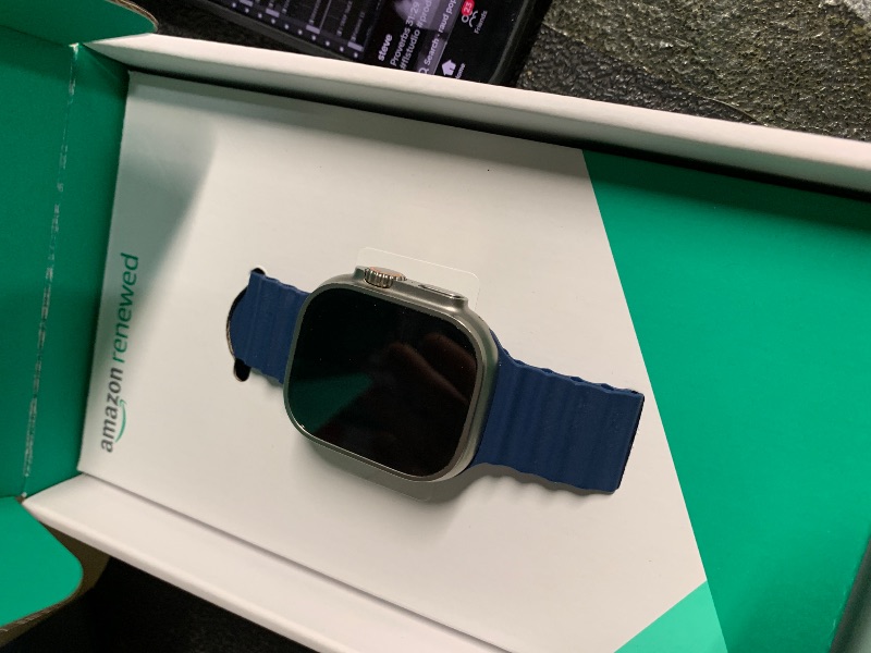 Photo 1 of ***LOCKED INTO OLD ACCOUNT***
Apple Watch Ultra 2 [GPS + Cellular, 49mm] - Titanium Case with Blue Ocean Band, One Size (Renewed Premium)