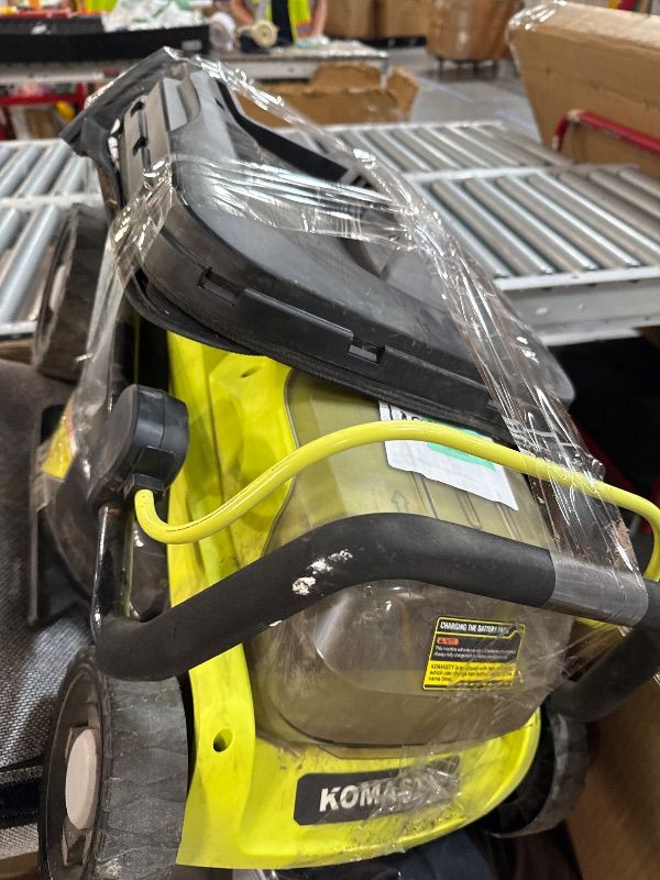 Photo 1 of * MISSING BATTERY AND CHARGERS* DIRTY AND HEAVILY USED* KOMASTY 40V Electric Lawn Mower 15" Cordless Battery Powered Mower, 2 in 1 Mulching Lawnmower with Height Adjustment Gallon Bag, Small Push Lawn Trimmer, 4.0Ah Battery and 2 Chargers Yellow