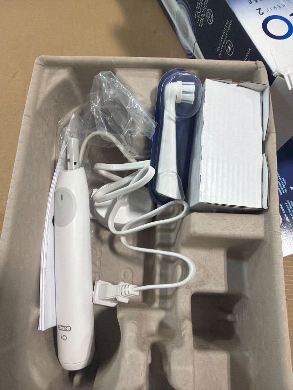Photo 1 of [missing parts] Oral-B Rechargeable Electric Toothbrush, iO Limited Simple Clean, 3 Cleaning Modes, Automatic Pressure Sensor to Protect Gums, Travel Case, White