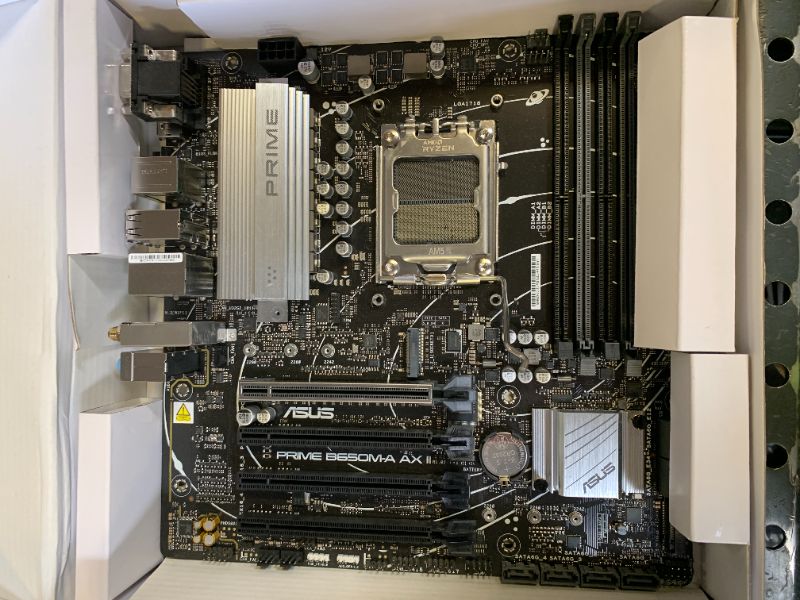 Photo 1 of ASUS Prime B650M-A AX II AMD B650 AM5 Ryzen™ Desktop 9000 8000 & 7000 Micro-ATX mATX Motherboard, DDR5, PCIe 5.0 M.2, 2.5Gb LAN, Wi-Fi 6, DisplayPort, HDMI®, USB 3.2, USB 3.2 Type-C®, BIOS Flashback™