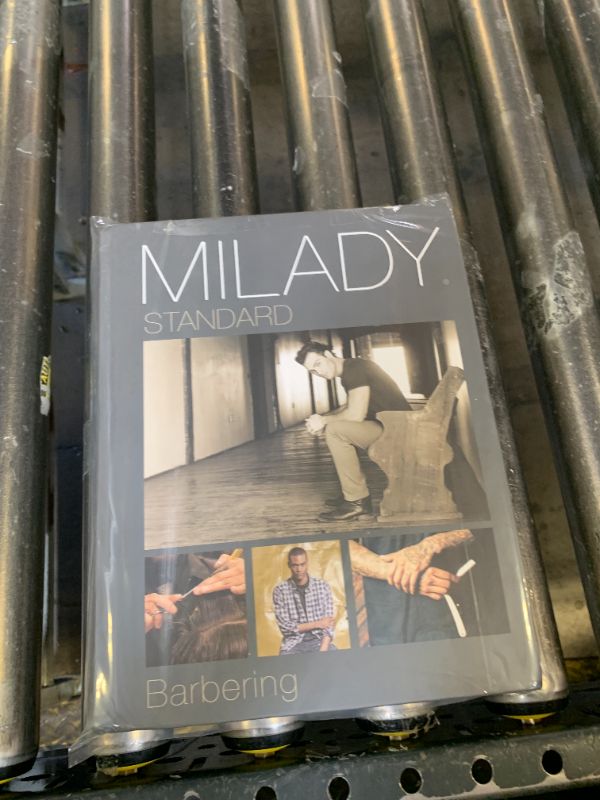 Photo 1 of Milady Standard Barbering (MindTap Course List)