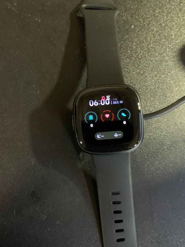 Photo 1 of Fitbit Versa 4 Fitness Smartwatch with Daily Readiness - 3-Month Google Health Premium Membership Included - GPS, 24/7 Heart Rate, 40+ Exercise Modes, Sleep Tracking - Black/Graphite