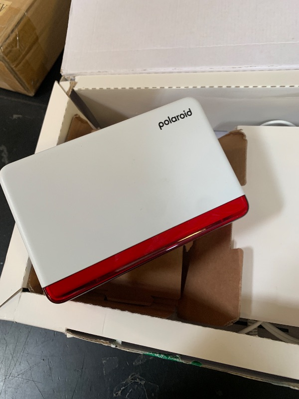 Photo 1 of Polaroid Hi-Print Bluetooth 4x6 Photo Printer + Photo Paper Bundle (80 Sheets Included) (6552)