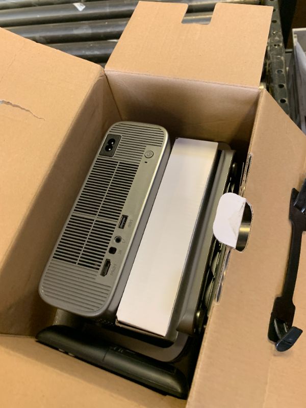 Photo 1 of Smart 4K Projector [Bundled with Google TV Stick] with WiFi and Bluetooth, 2500ANSI, Auto Lens Cap, Portable Outdoor Movie Projector with Built-in Apps Auto Focus for Ceiling/Home Theater/Bedroom