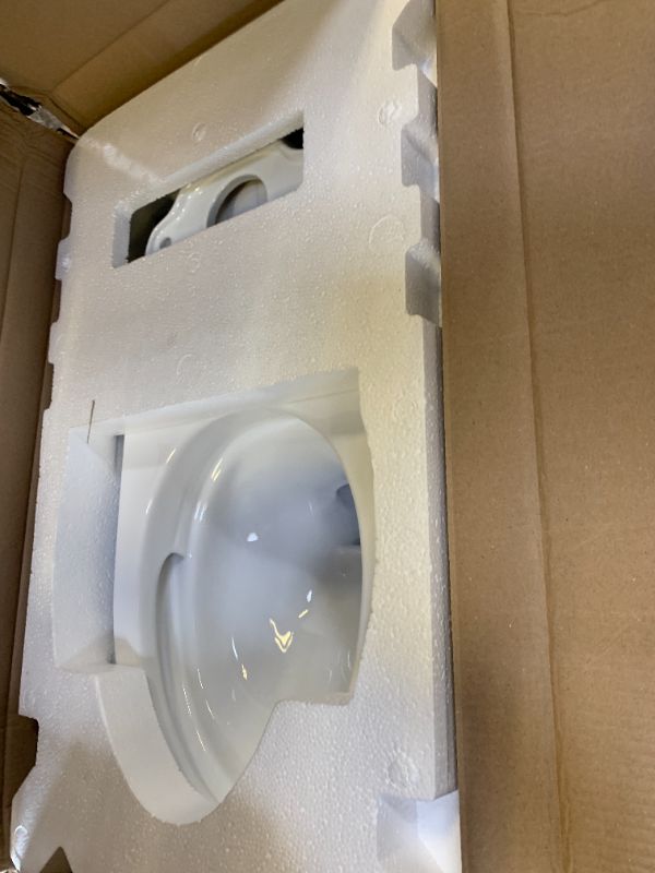 Photo 1 of TOTO Drake Transitional Two-Piece Elongated 1.28 GPF Universal Height TORNADO FLUSH Toilet with CEFIONTECT, Cotton White - CST786CEFG#01