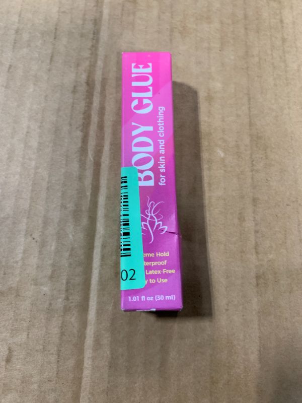 Photo 1 of ***USED*** Body Adhesive for Clothing, Sweat Resistant & Long Lasting Body Glue for Clothes, Strong Hold for Dancers, Wigs, Bras, Stagewear & Costumes (30ml)