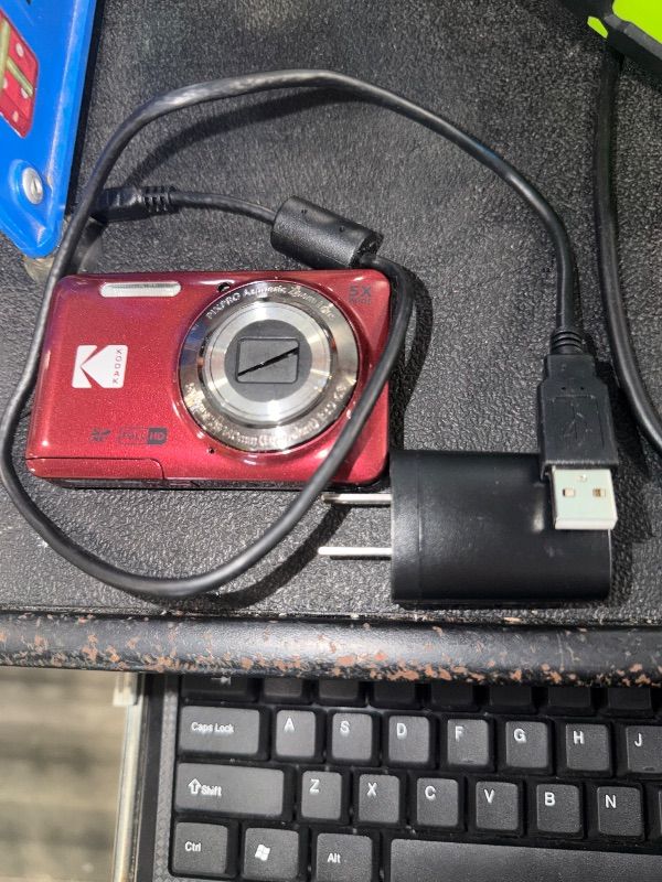 Photo 1 of ***BROKEN, SOLD FOR PARTS*** Kodak PIXPRO FZ55-RD 16MP Digital Camera 5X Optical Zoom 28mm Wide Angle 1080P Full HD Video 2.7" LCD Vlogging Camera (Red) Packaging May Vary