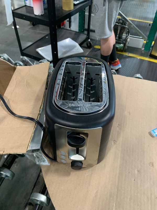 Photo 1 of ******DIRTY*******Amazon Basics 2 Slice Toaster, Extra Wide Slots for Bagels, 6 Browning Settings, Removable Crumb Tray, Defrost/Cancel/Bagel Buttons, Cord Wrap, 900W, Black & Silver