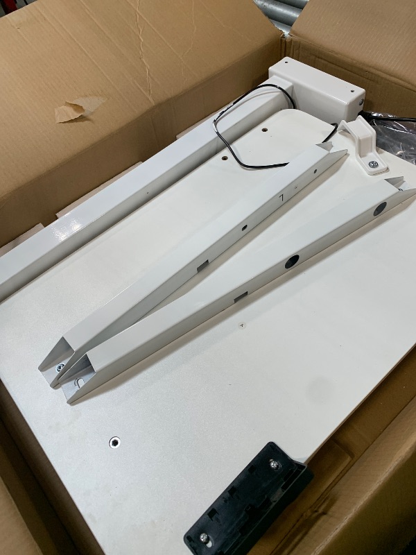 Photo 1 of ** DOES NOT WORK Does not raise and lower*****07/31 SOLD FOR PARTS // FINAL SALE *** YOLEZO Electric Overbed Table with Hidden Wheels, Height Adjustable Mobile Sit-Stand Bedside Desk, Rolling Laptop Desk for Bed, Sofa & Hospital Use(24" x 16", White)