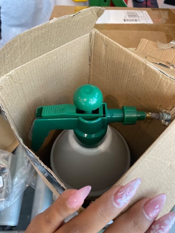 View 3 of [Heavily Used] VIVOSUN Handheld Garden Sprayer, 1L Pump Sprayer, 34oz Water Spray Bottle with Safety Valve, Adjustable Nozzle, Extended Spray Rod & Additional Seals, Ideal for Watering, Fertilizing, Cleaning
